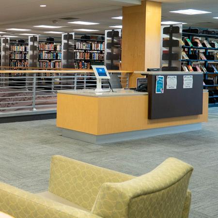 Blackmore Library shelves and information desk